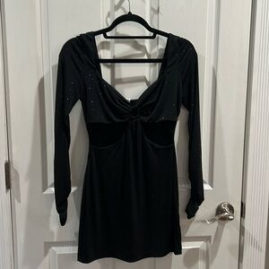 Long sleeve black mini dress with cutouts and sparkles